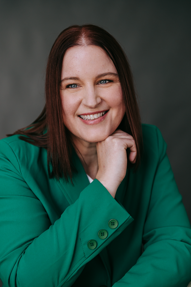 Sumara Meers, Australian actor, smiling in green jacket
